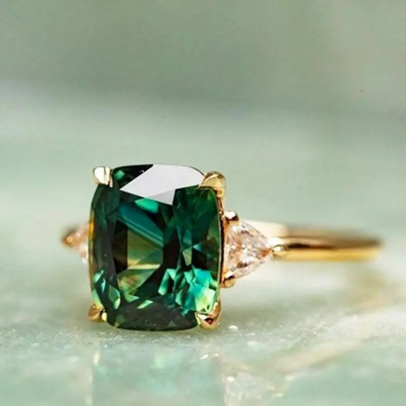 Ġojjell Elegantiċ tal-Emerald Kwatru