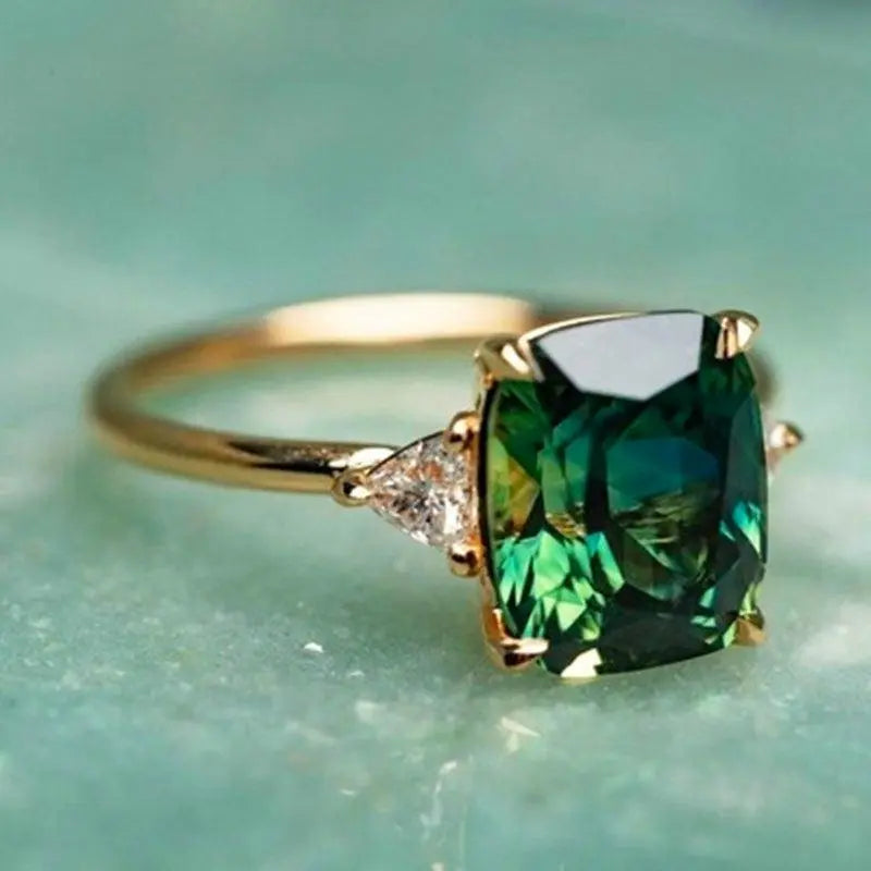 Ġojjell Elegantiċ tal-Emerald Kwatru